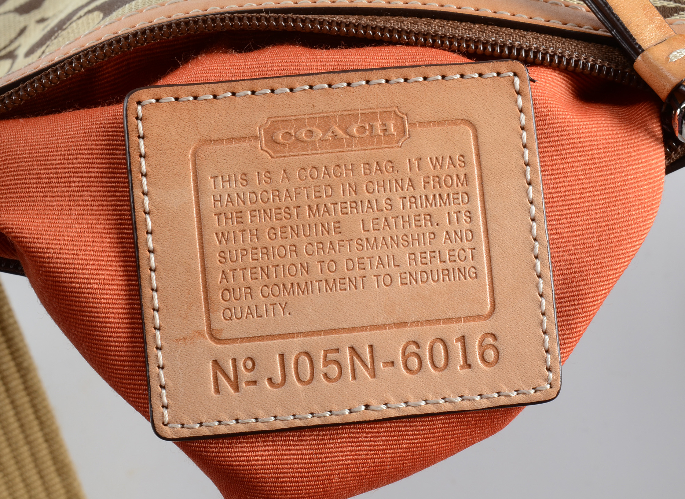 Three Coach Signature Handbags