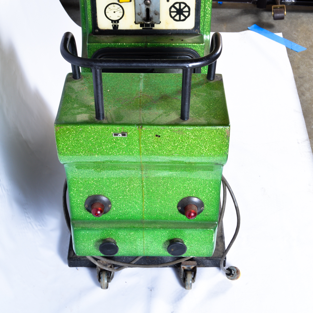 Green Coin Operated Train Ride