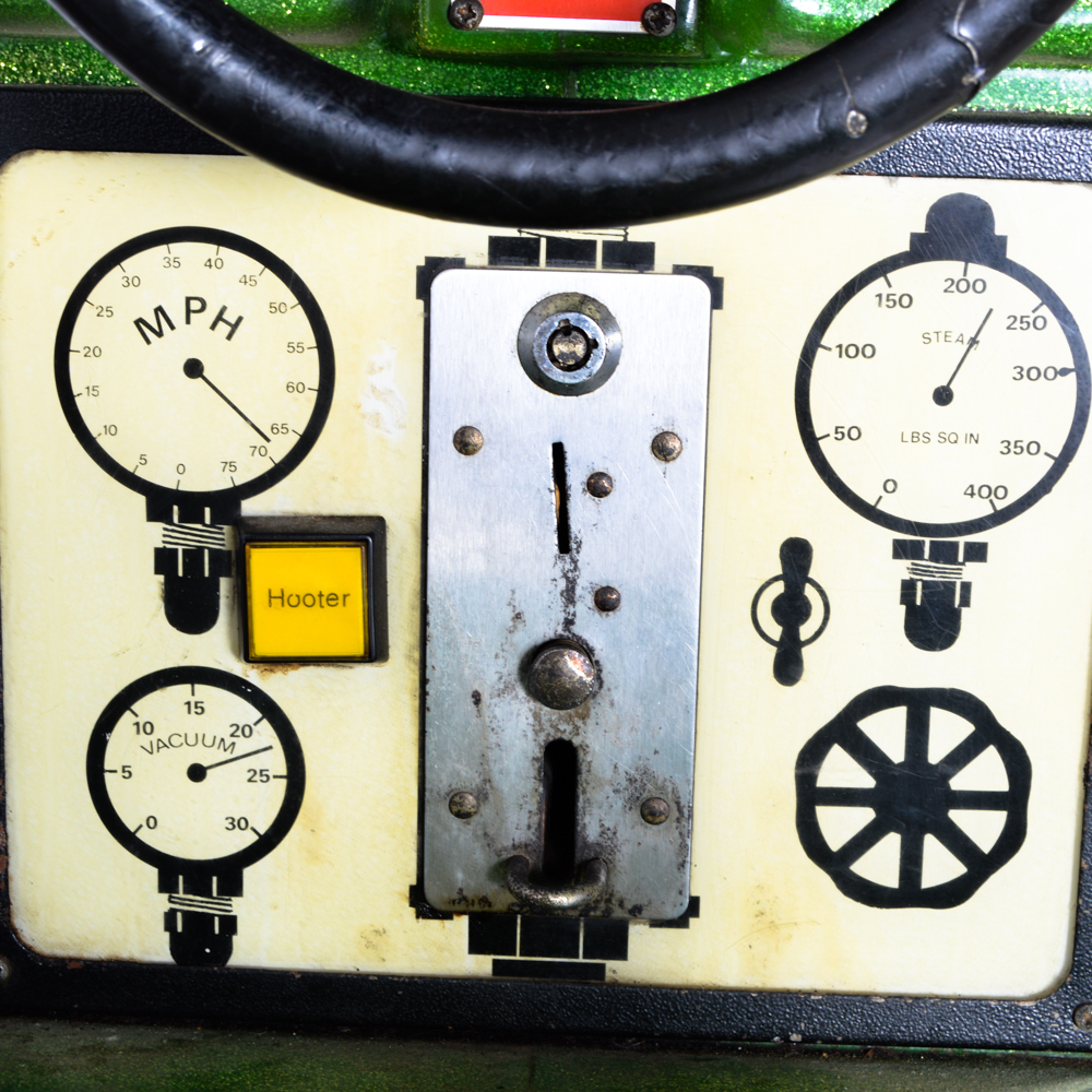 Green Coin Operated Train Ride