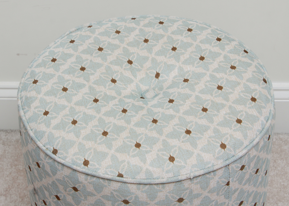 Round Upholstered Privilege Ottoman
