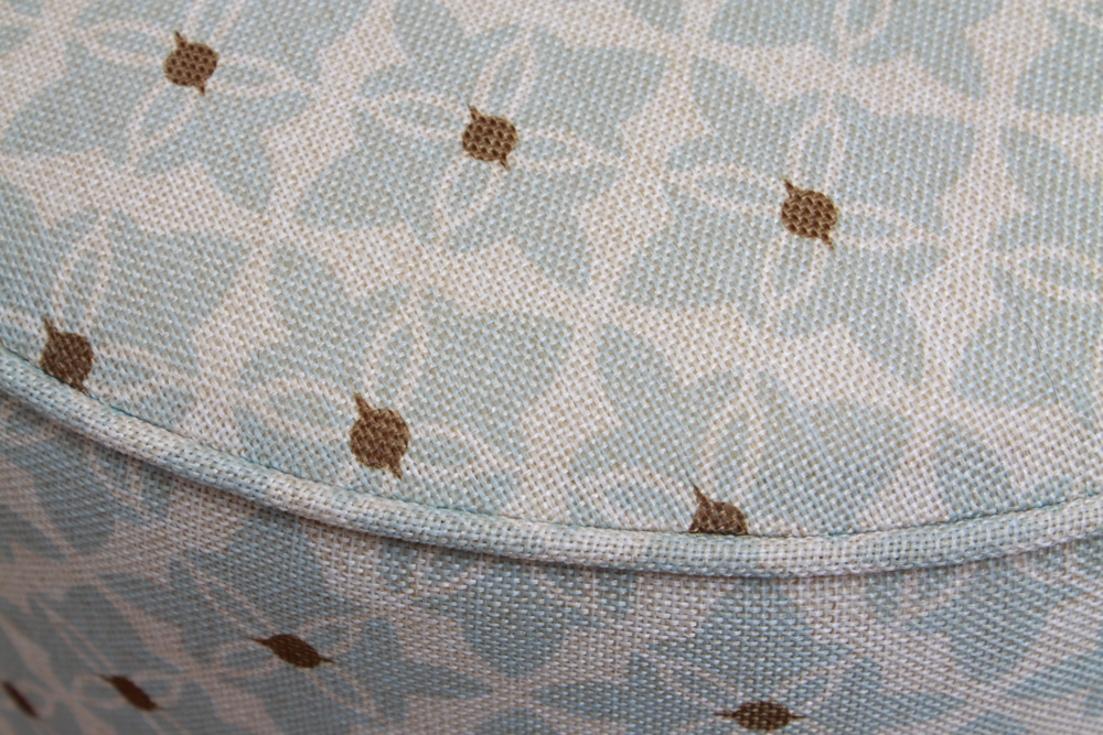 Round Upholstered Privilege Ottoman