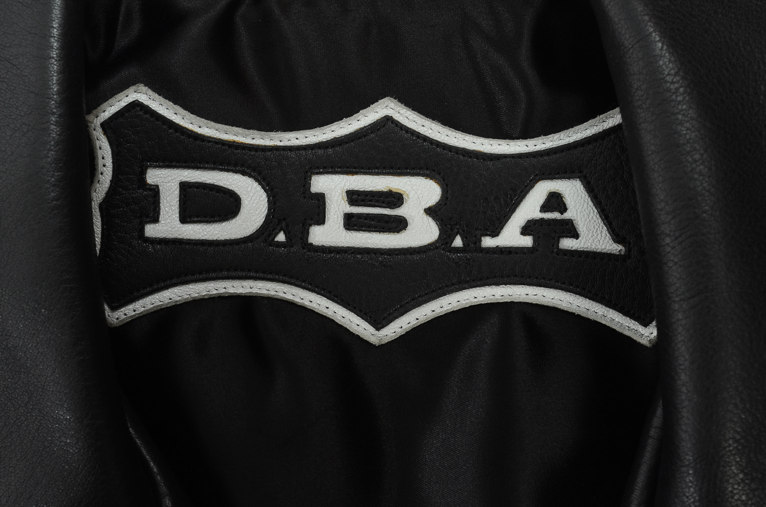 DBA Black and White Leather Motorcycle Jacket with Flames Accented in Red Stitching