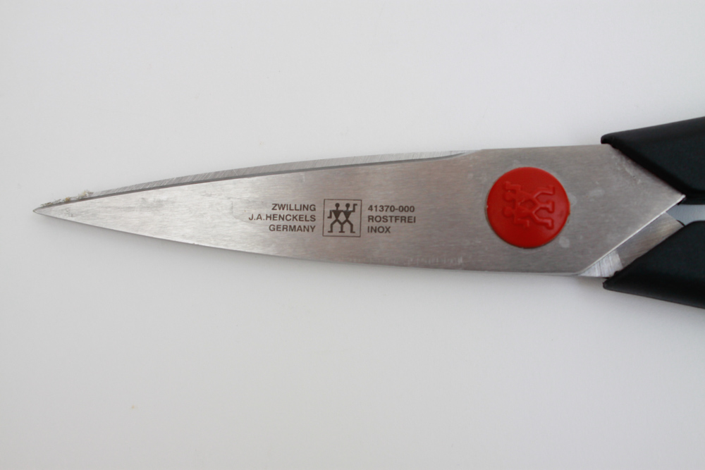 Set of J. A. Henckles International and Cuisinart Knives