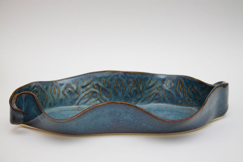 Collection of Colorful Ceramic Bakeware and Plates