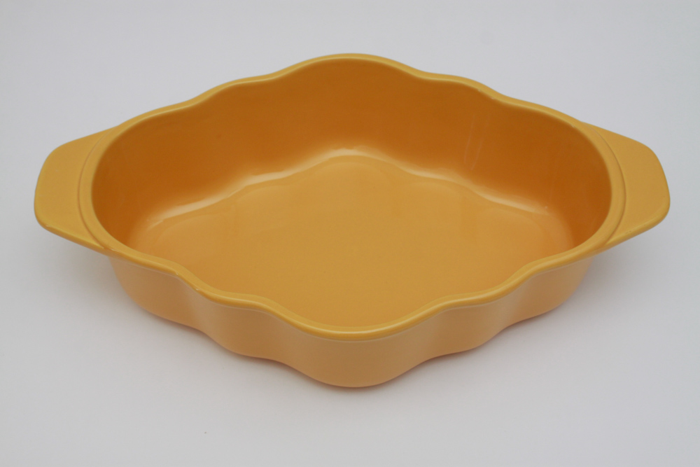 Collection of Colorful Ceramic Bakeware and Plates