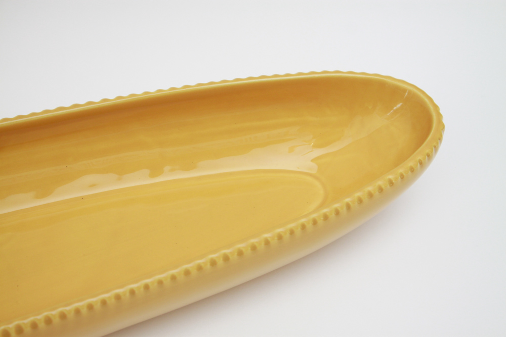 Collection of Colorful Ceramic Bakeware and Plates