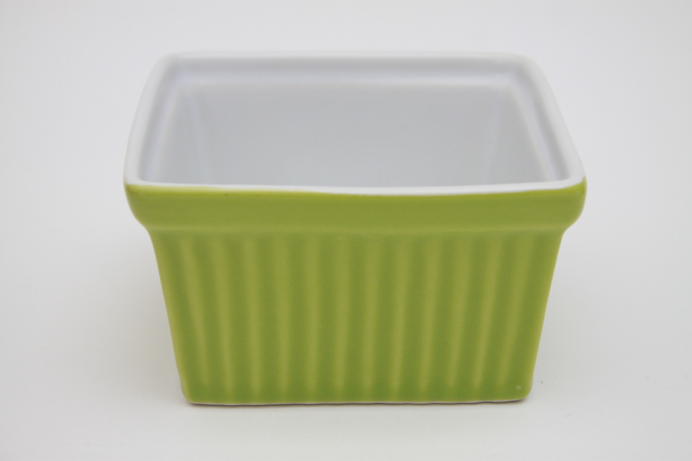 Collection of Colorful Ceramic Bakeware and Plates