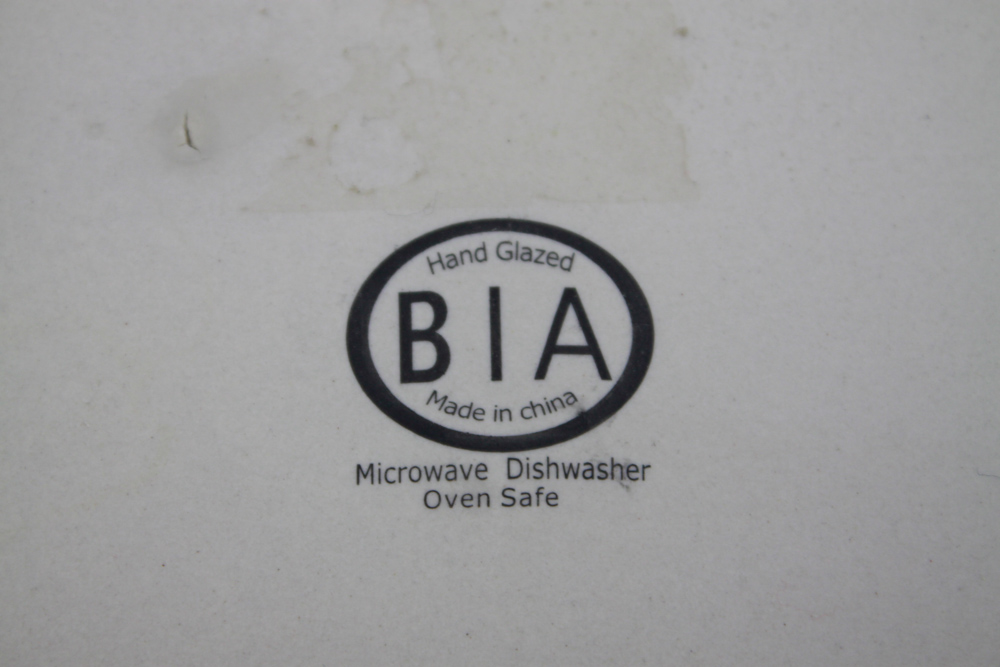 Collection of Colorful Ceramic Bakeware and Plates