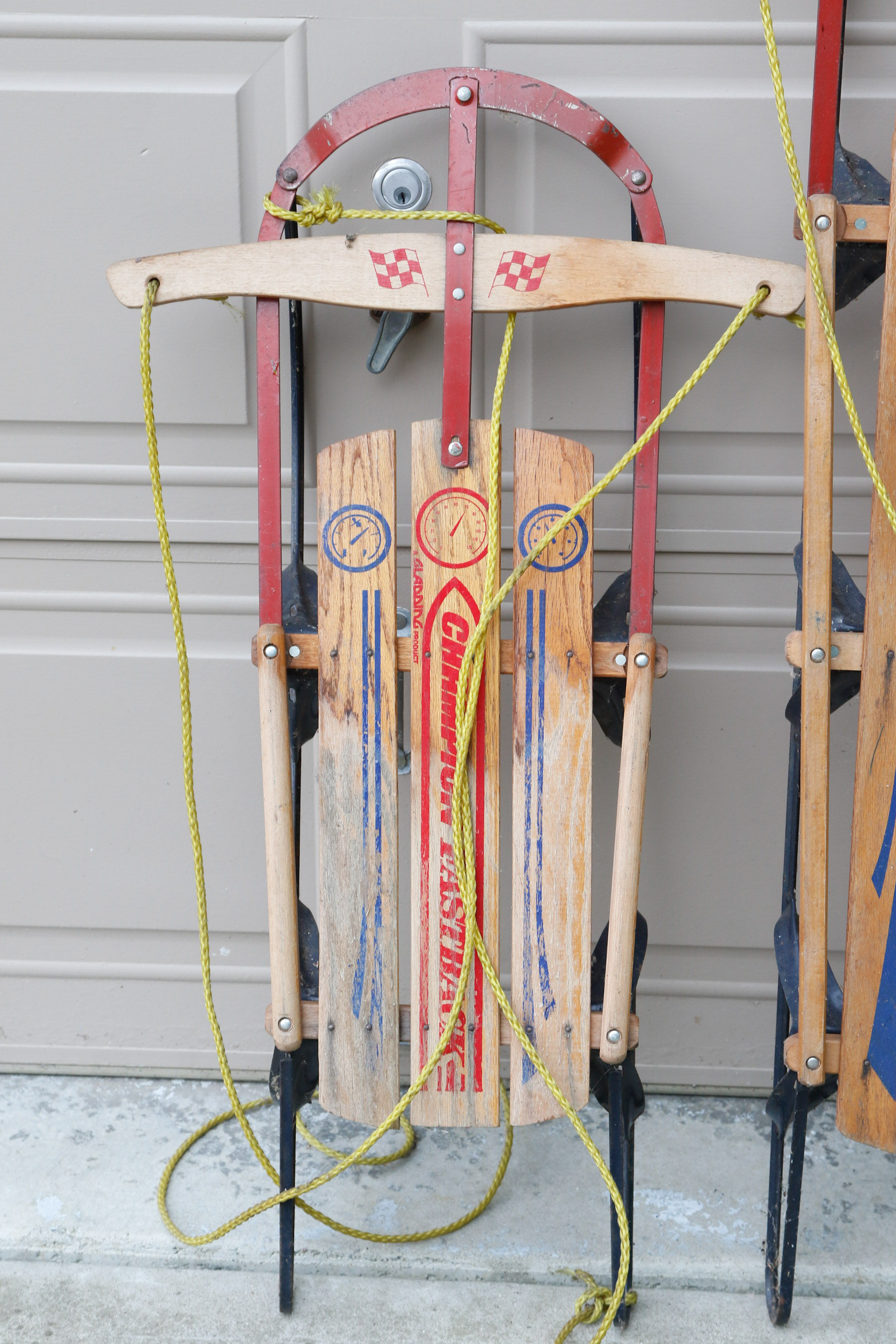 Pair of Champion Eastback Wooden Sleds