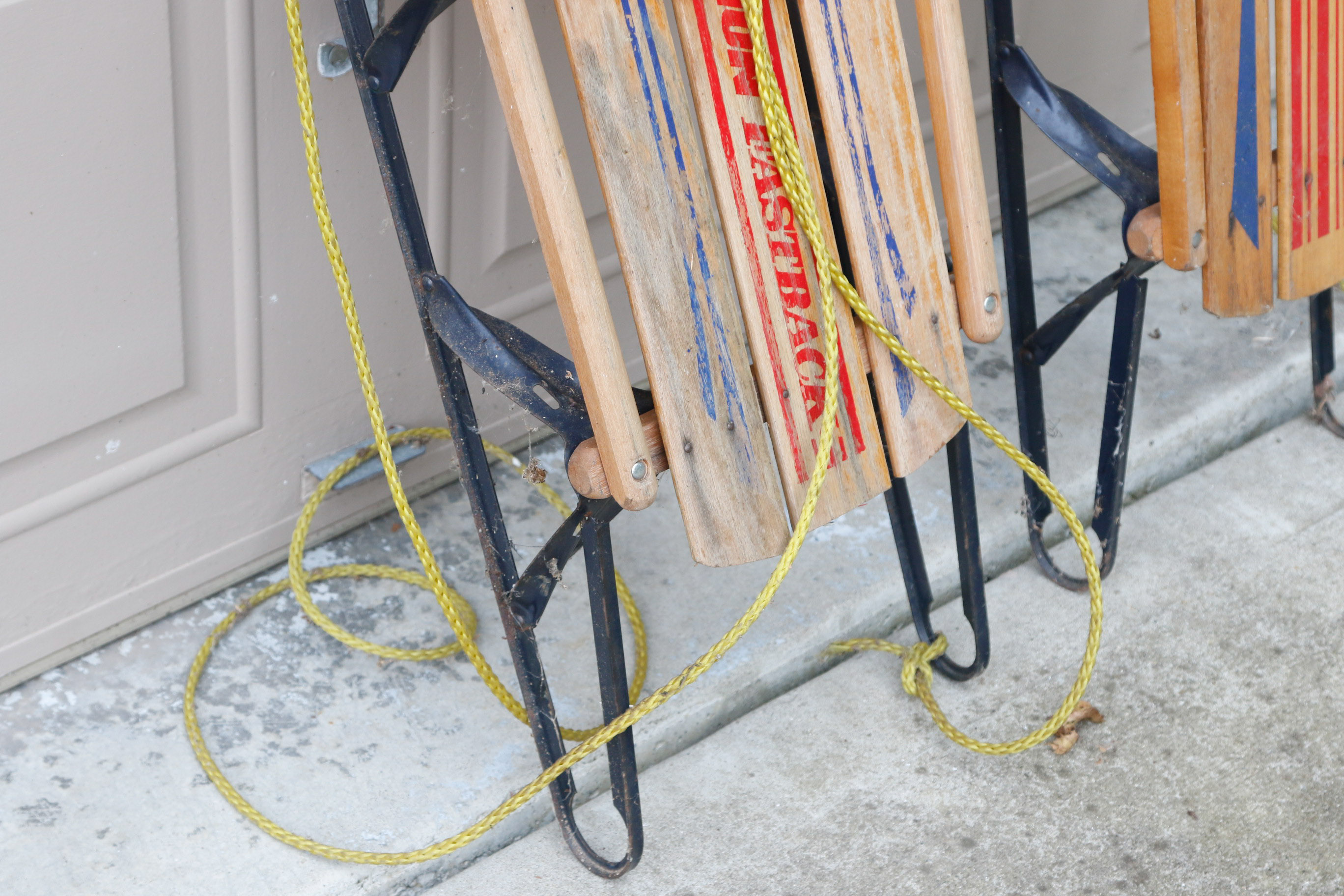 Pair of Champion Eastback Wooden Sleds