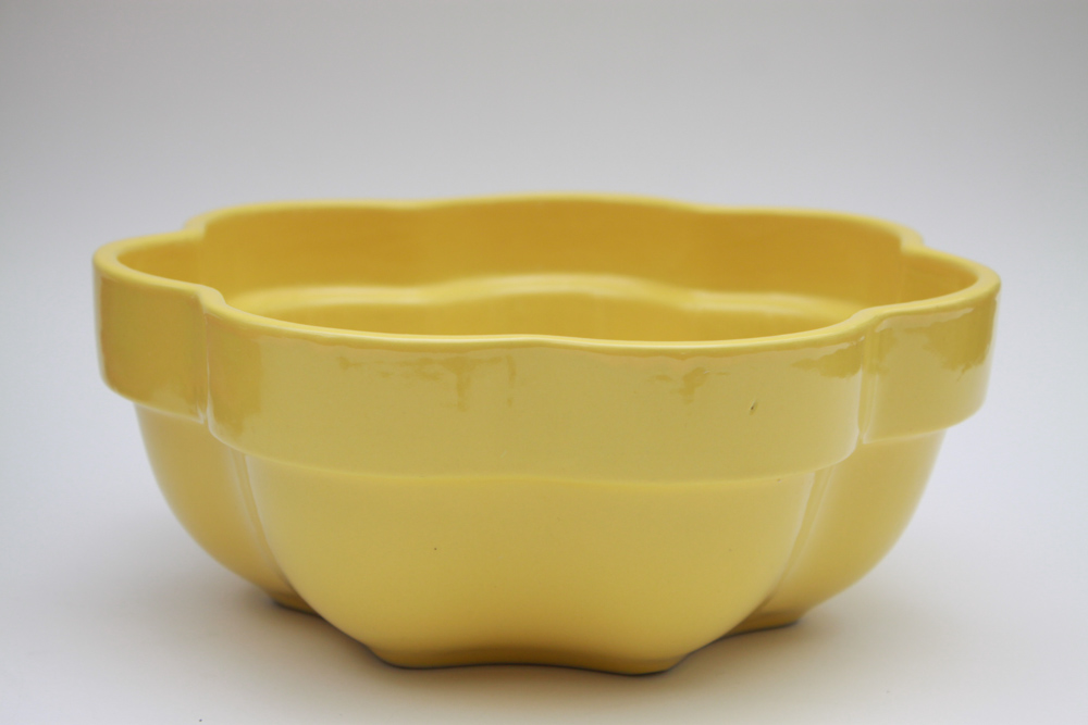 Collection of Colorful Ceramic Bakeware and Plates