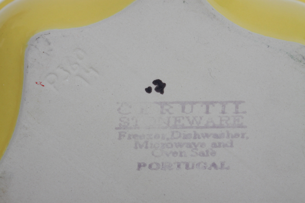 Collection of Colorful Ceramic Bakeware and Plates