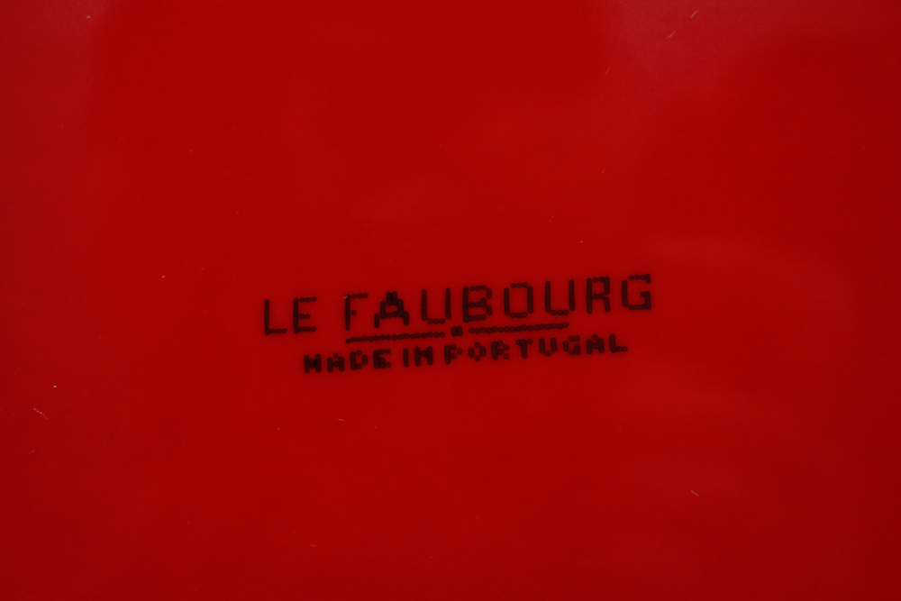 Collection of Colorful Ceramic Bakeware and Plates