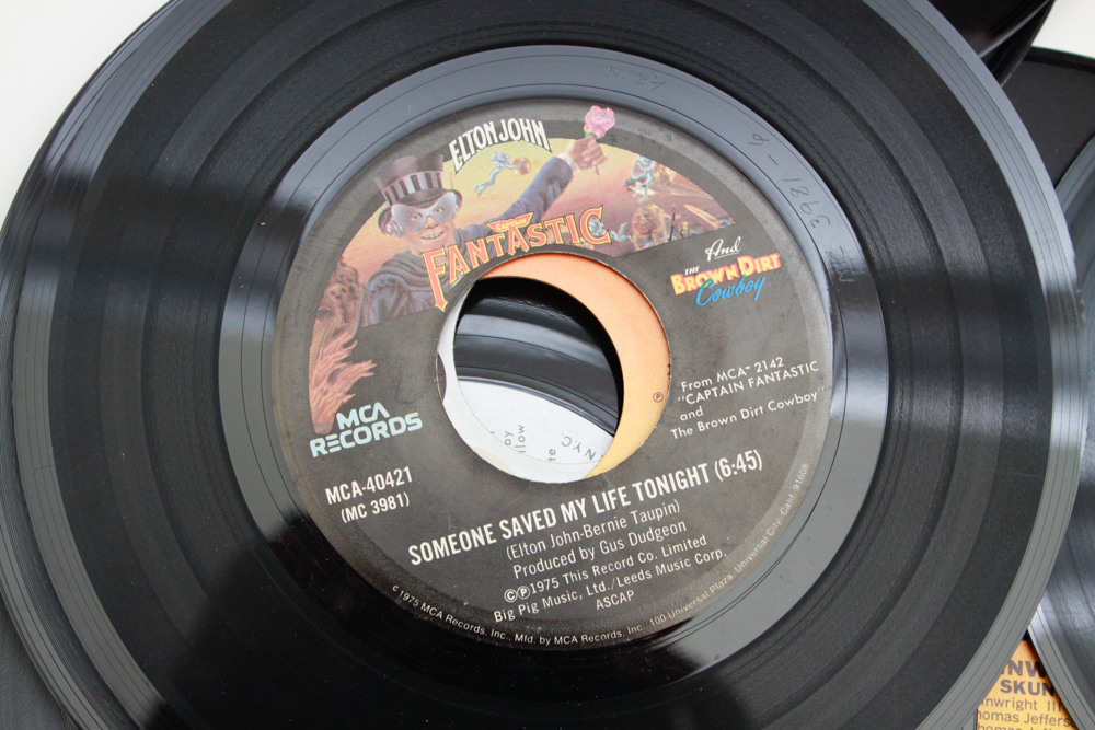 Classic Rock and Pop 45 rpm Records in Vintage Carry Case