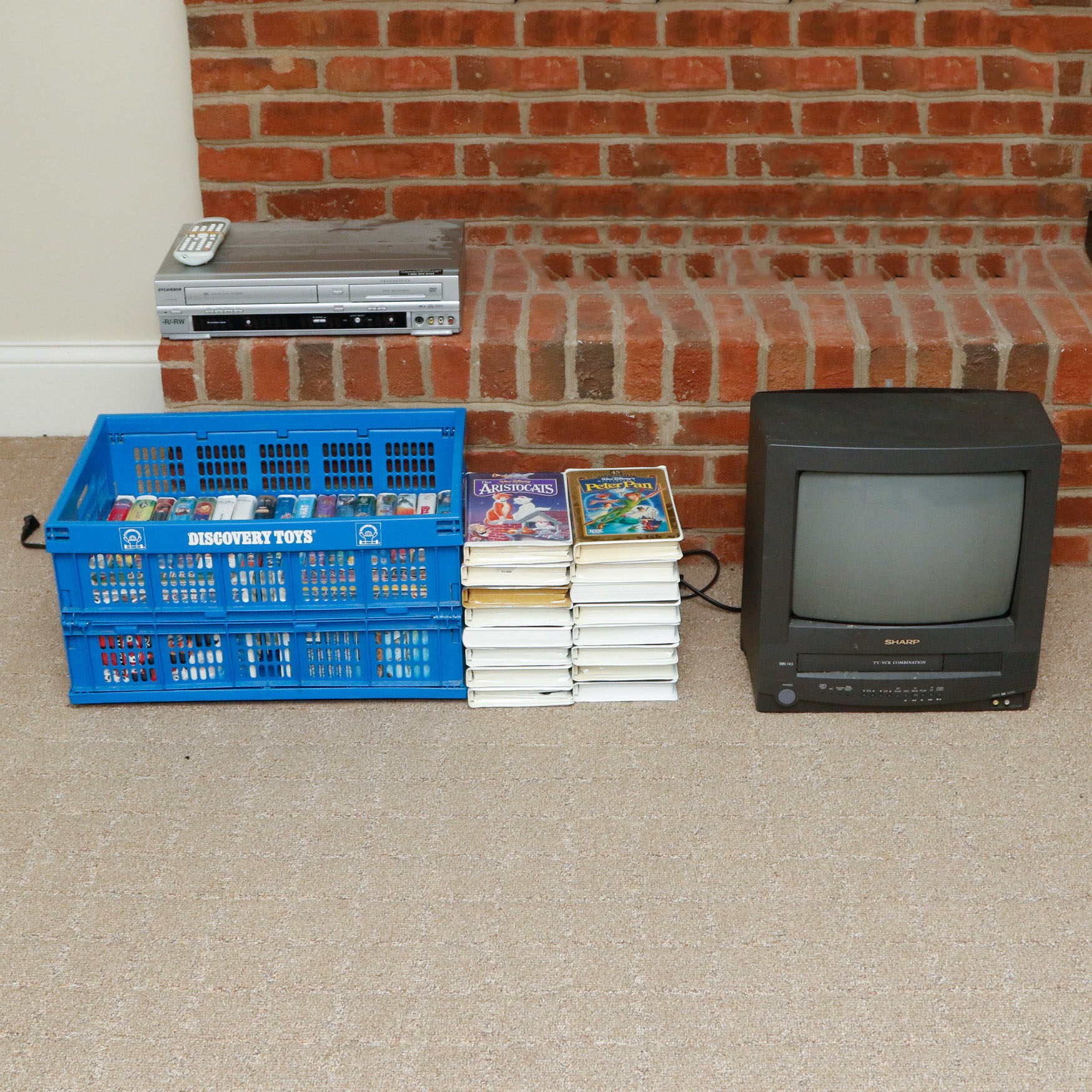 Disney VHS Collection with VHS/DVD Converter and Television