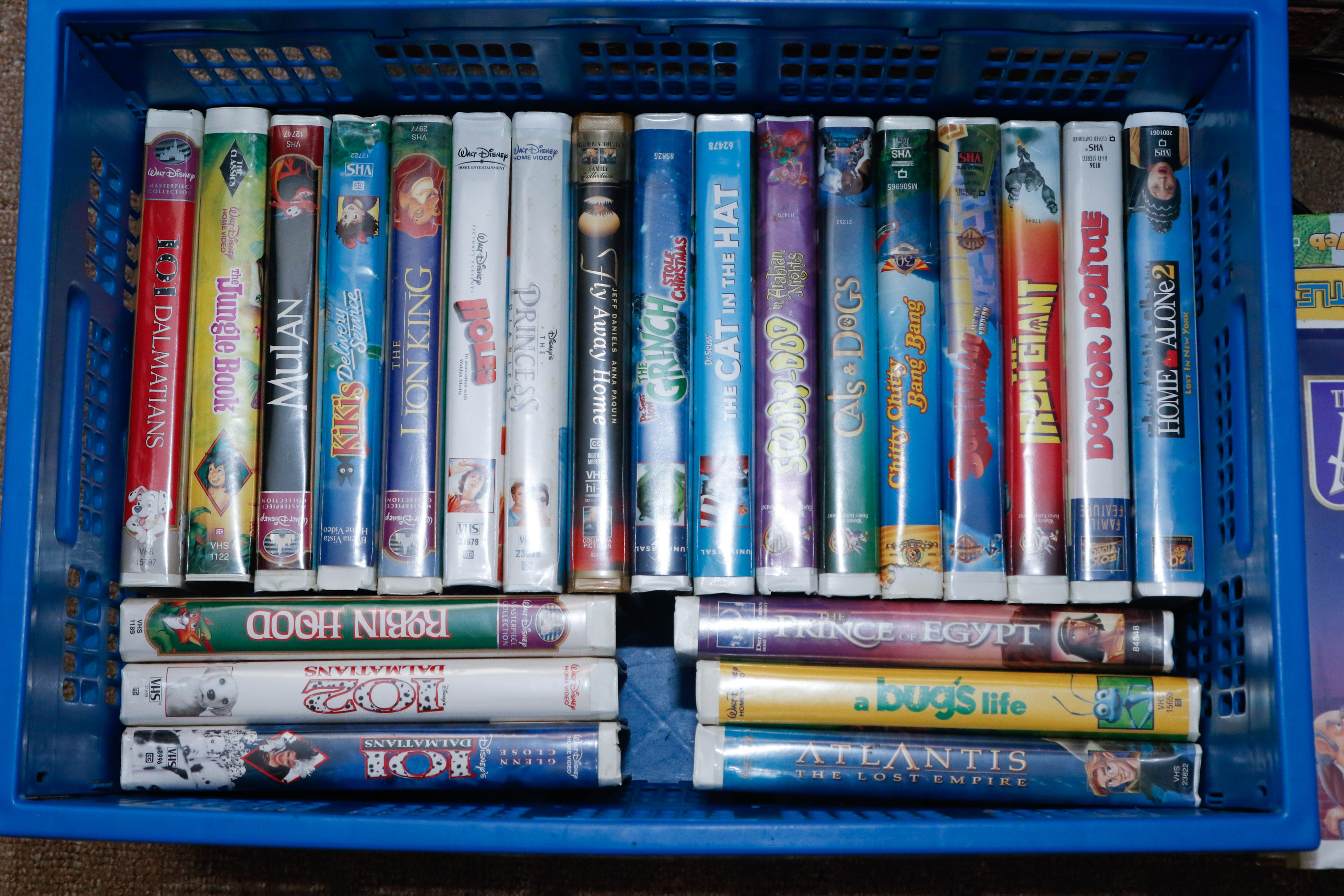 Disney VHS Collection with VHS/DVD Converter and Television