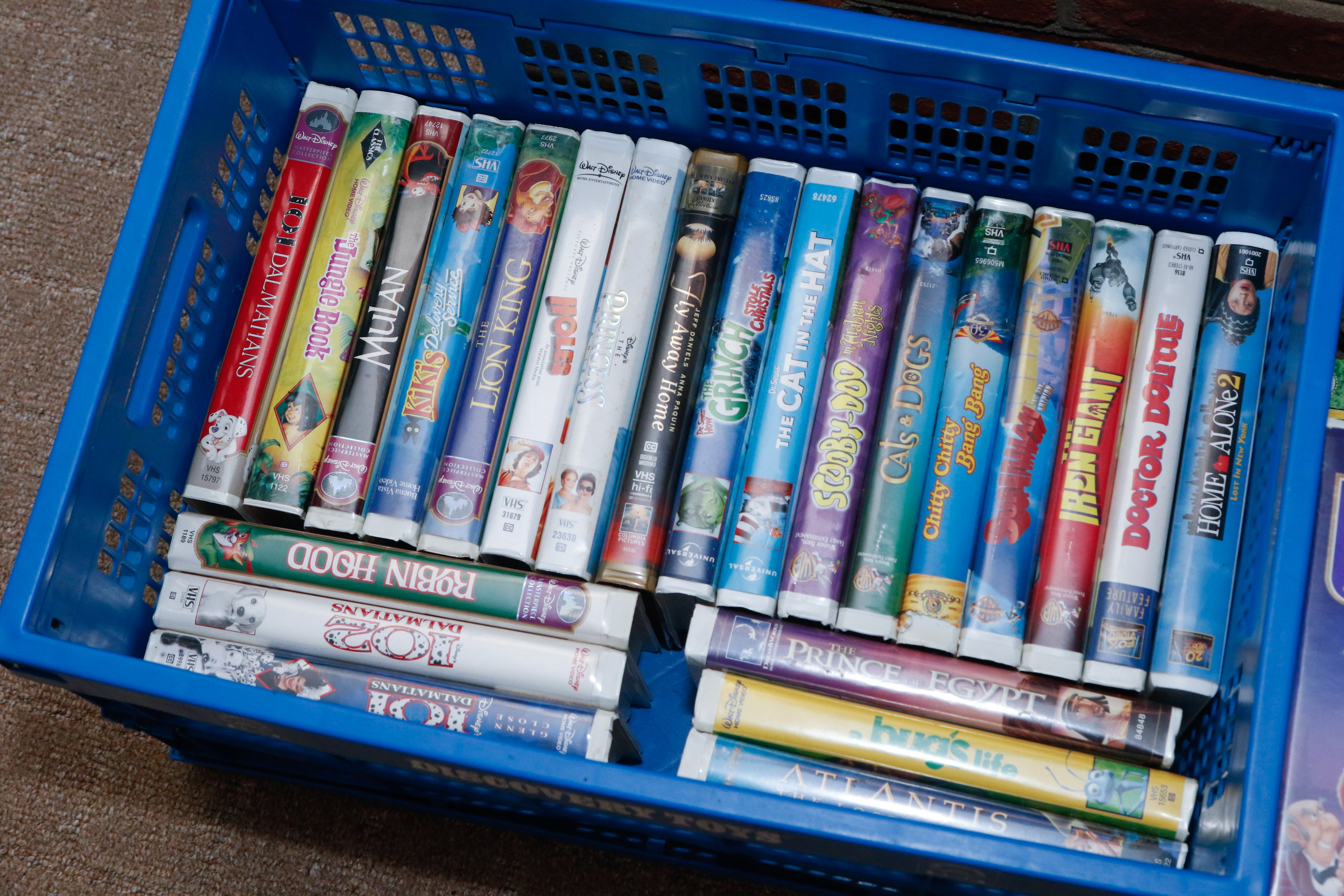 Disney VHS Collection with VHS/DVD Converter and Television