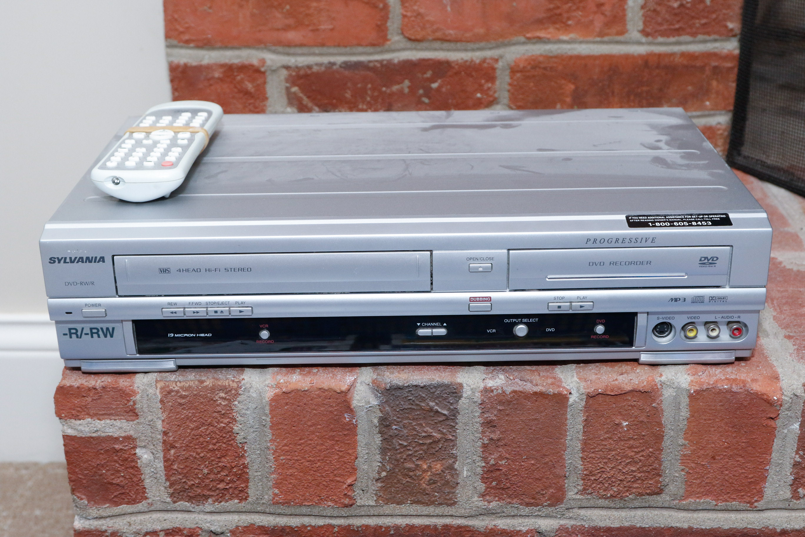 Disney VHS Collection with VHS/DVD Converter and Television