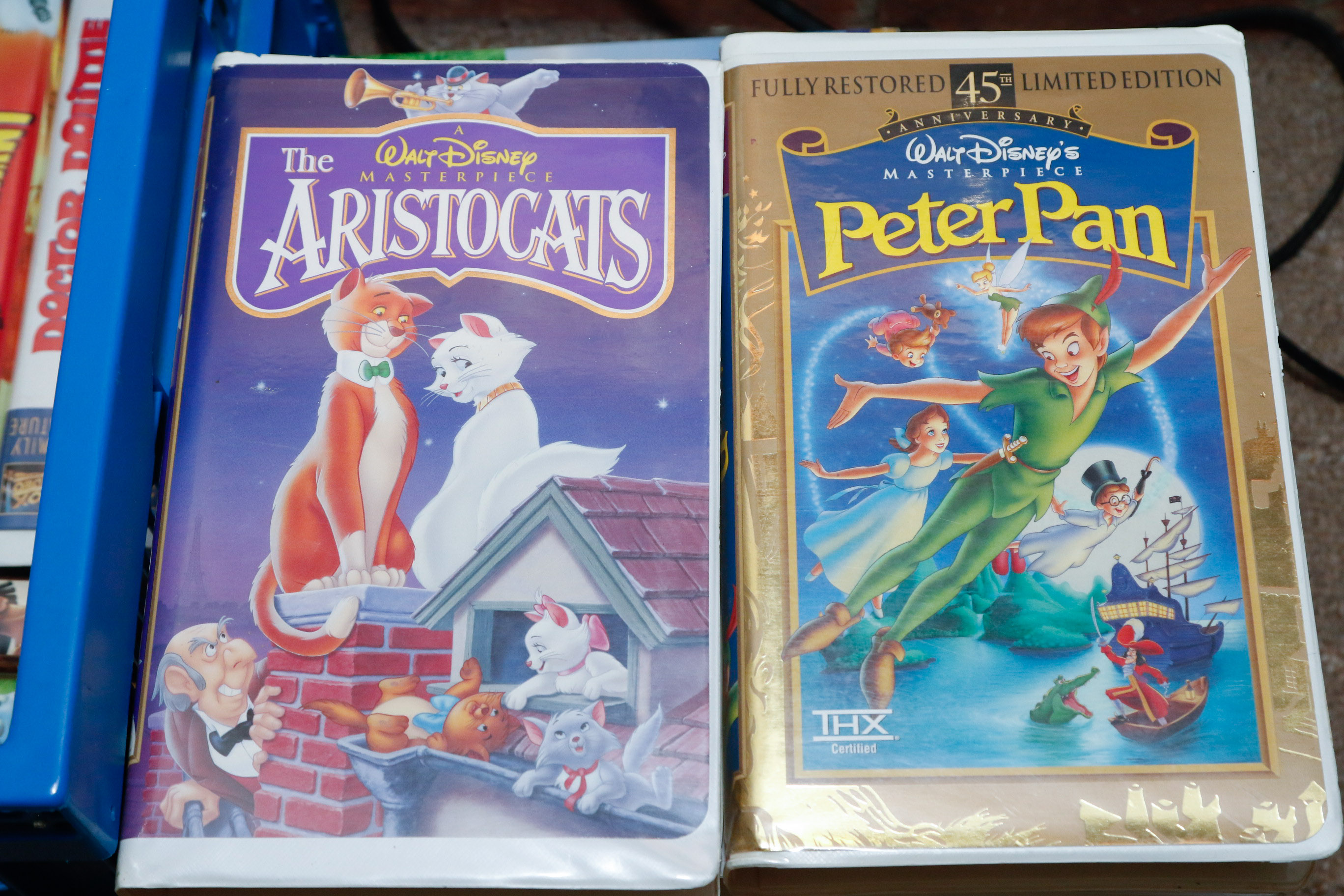 Disney VHS Collection with VHS/DVD Converter and Television