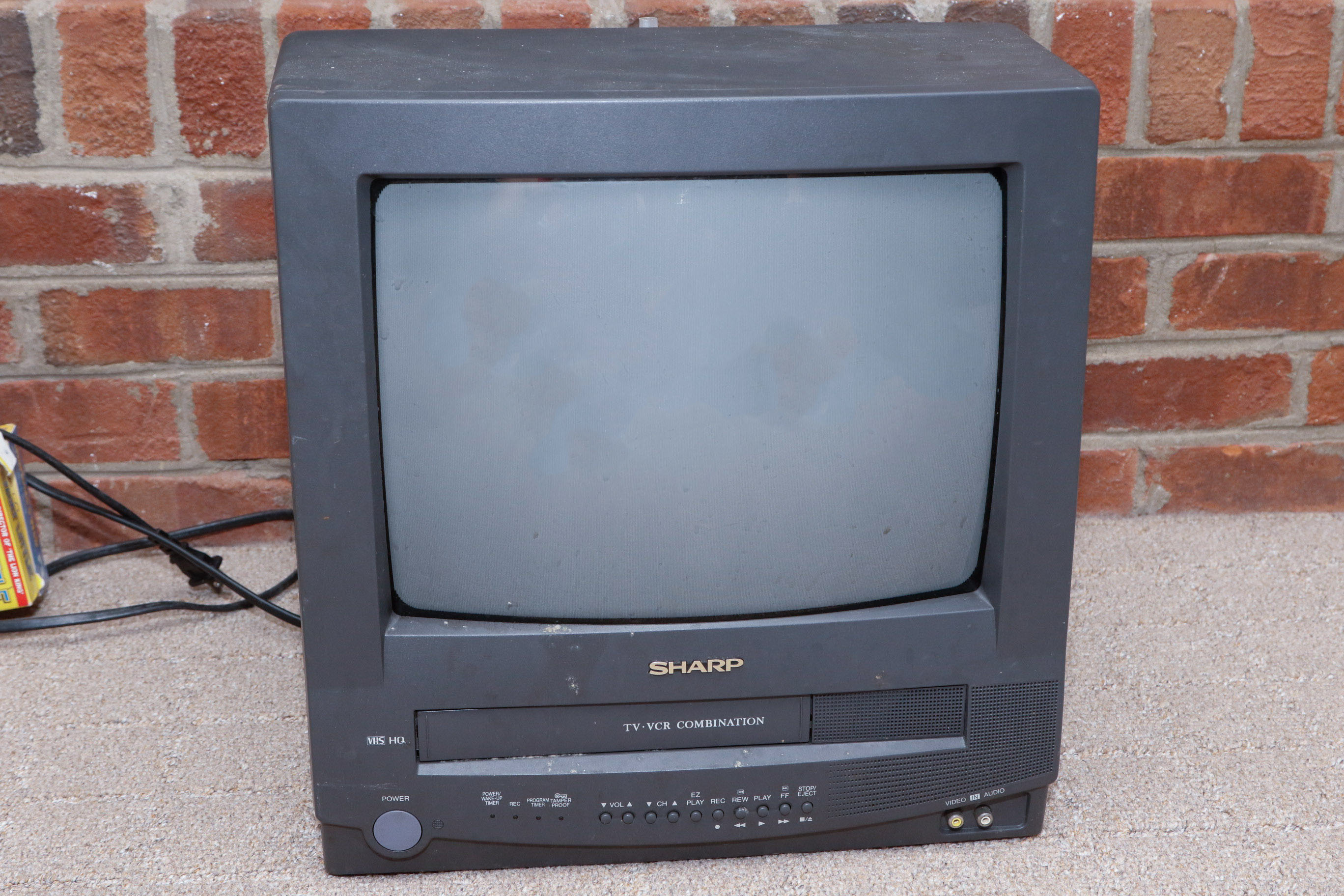 Disney VHS Collection with VHS/DVD Converter and Television