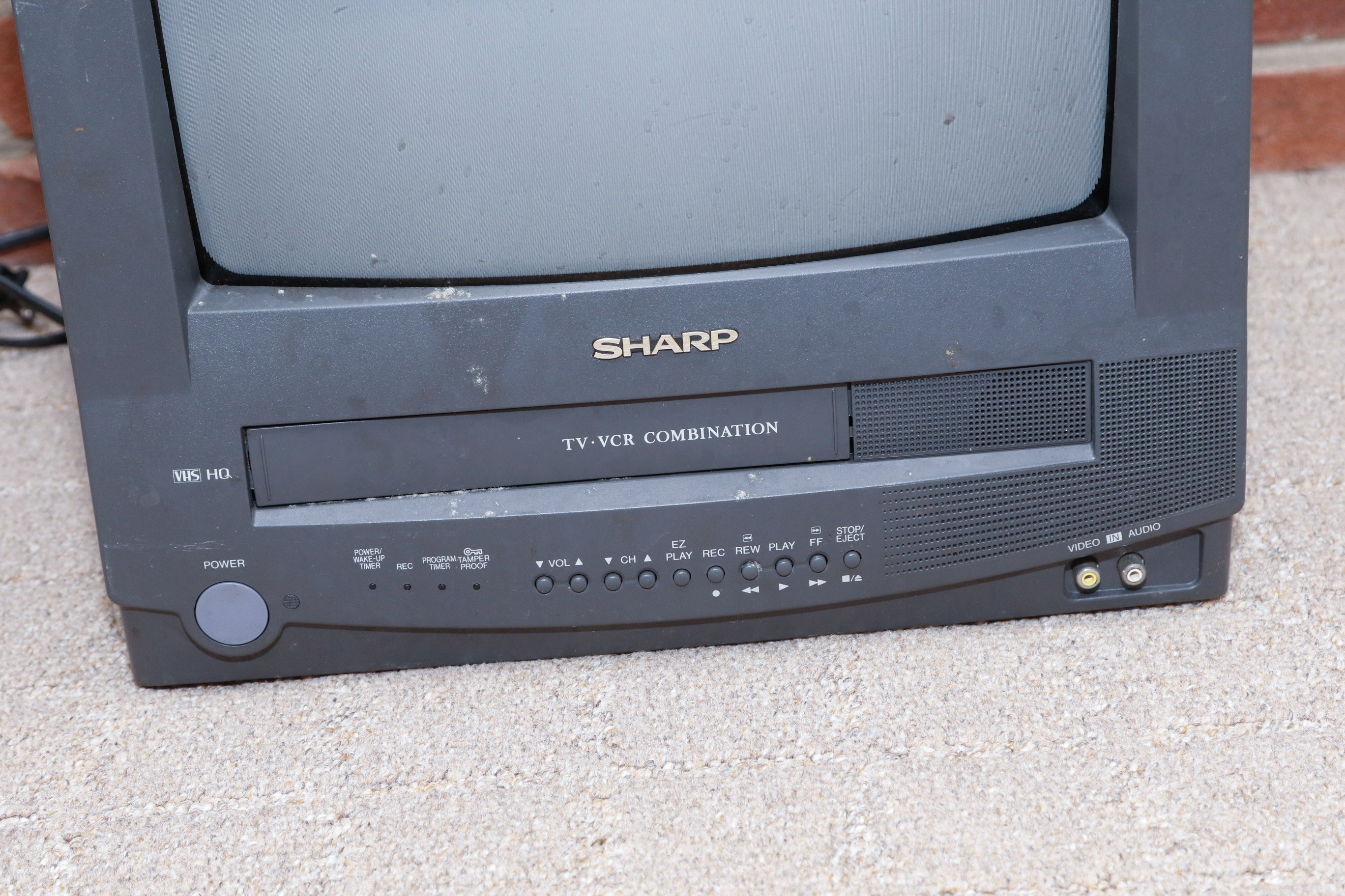 Disney VHS Collection with VHS/DVD Converter and Television