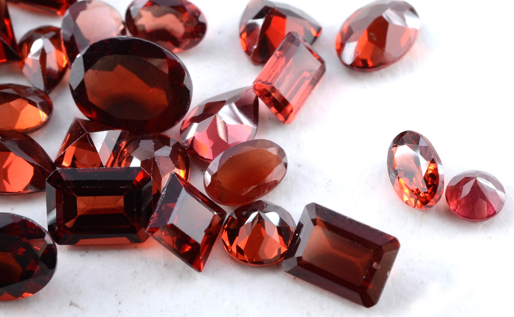Collection of Loose Garnet Cut Gemstones, 32.5 CTW