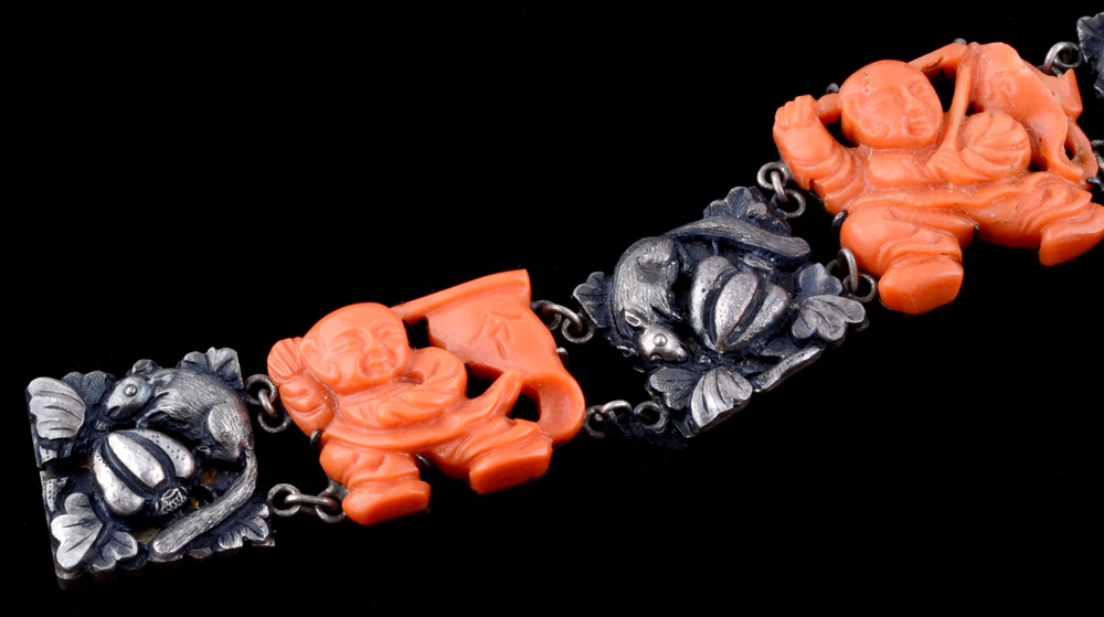Group of Early 20th Century Chinese Export Carved Coral Jewelry