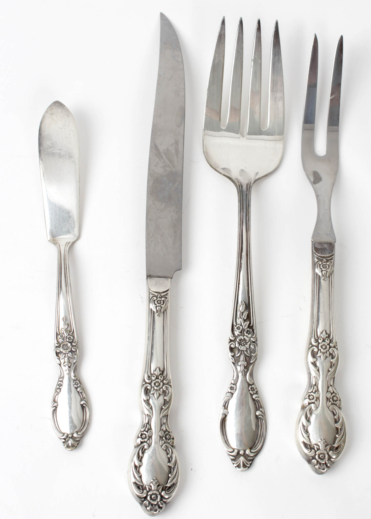 Fifty Piece Set of W.M. Rogers & Son Silverplated Victorian Rose Flatware