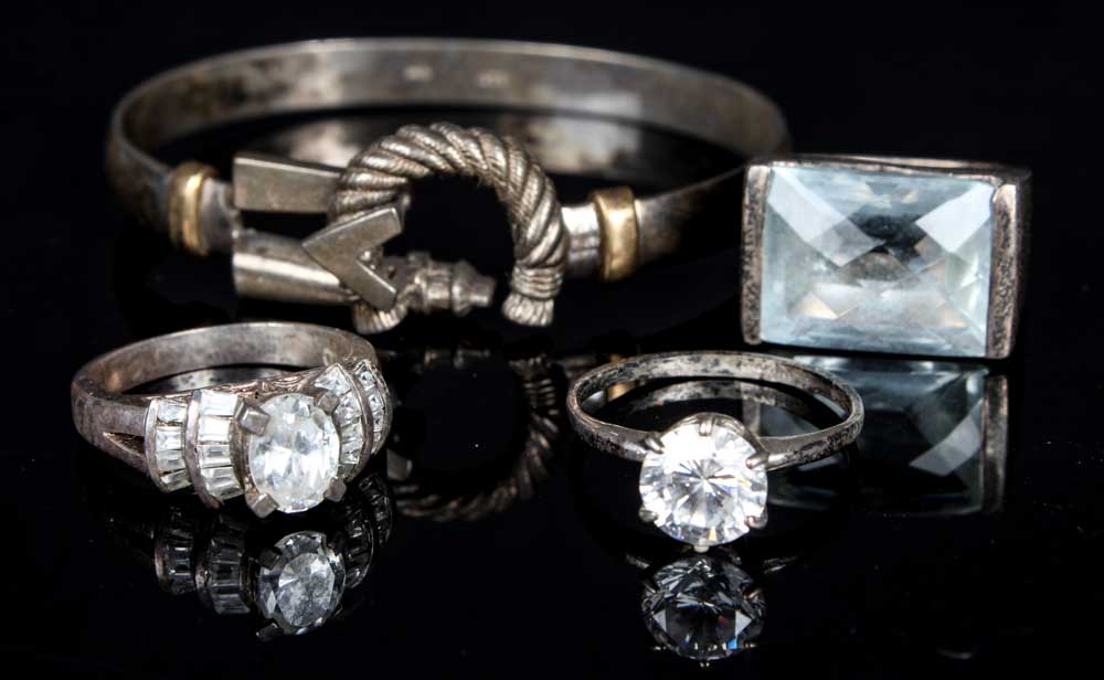 Trio of Sterling Silver Rings and Bangle Bracelet