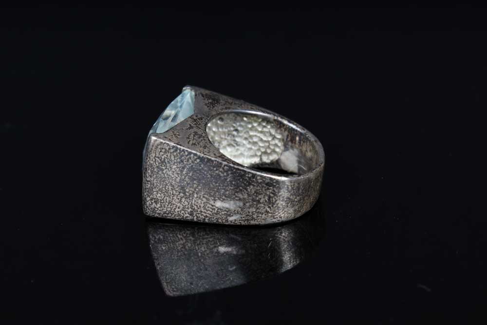 Trio of Sterling Silver Rings and Bangle Bracelet