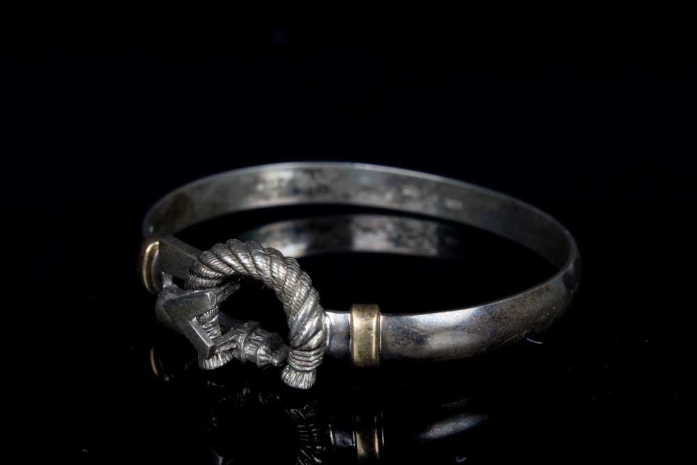 Trio of Sterling Silver Rings and Bangle Bracelet