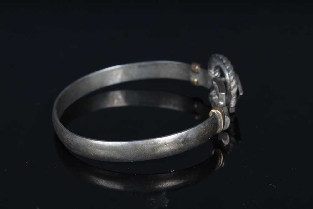Trio of Sterling Silver Rings and Bangle Bracelet