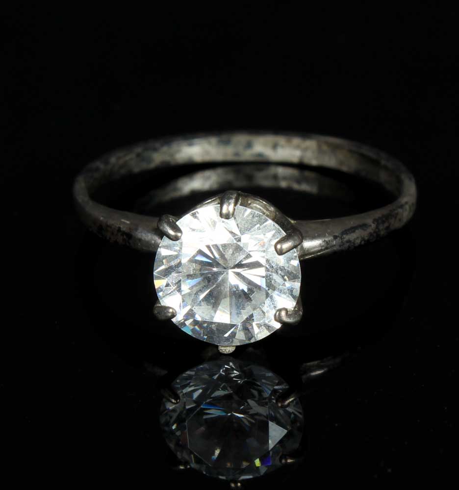 Trio of Sterling Silver Rings and Bangle Bracelet