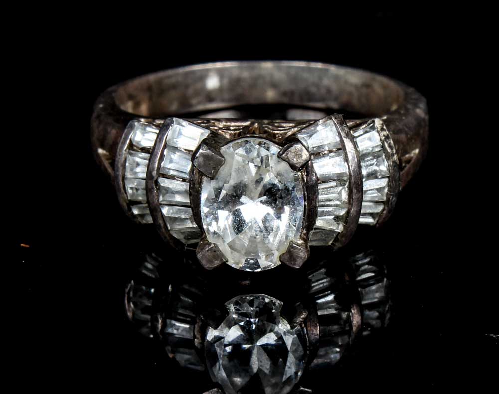 Trio of Sterling Silver Rings and Bangle Bracelet