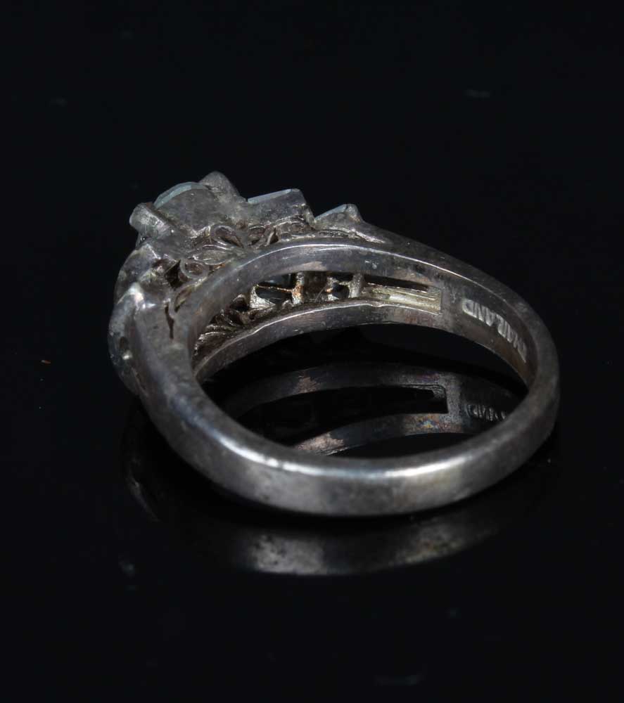 Trio of Sterling Silver Rings and Bangle Bracelet