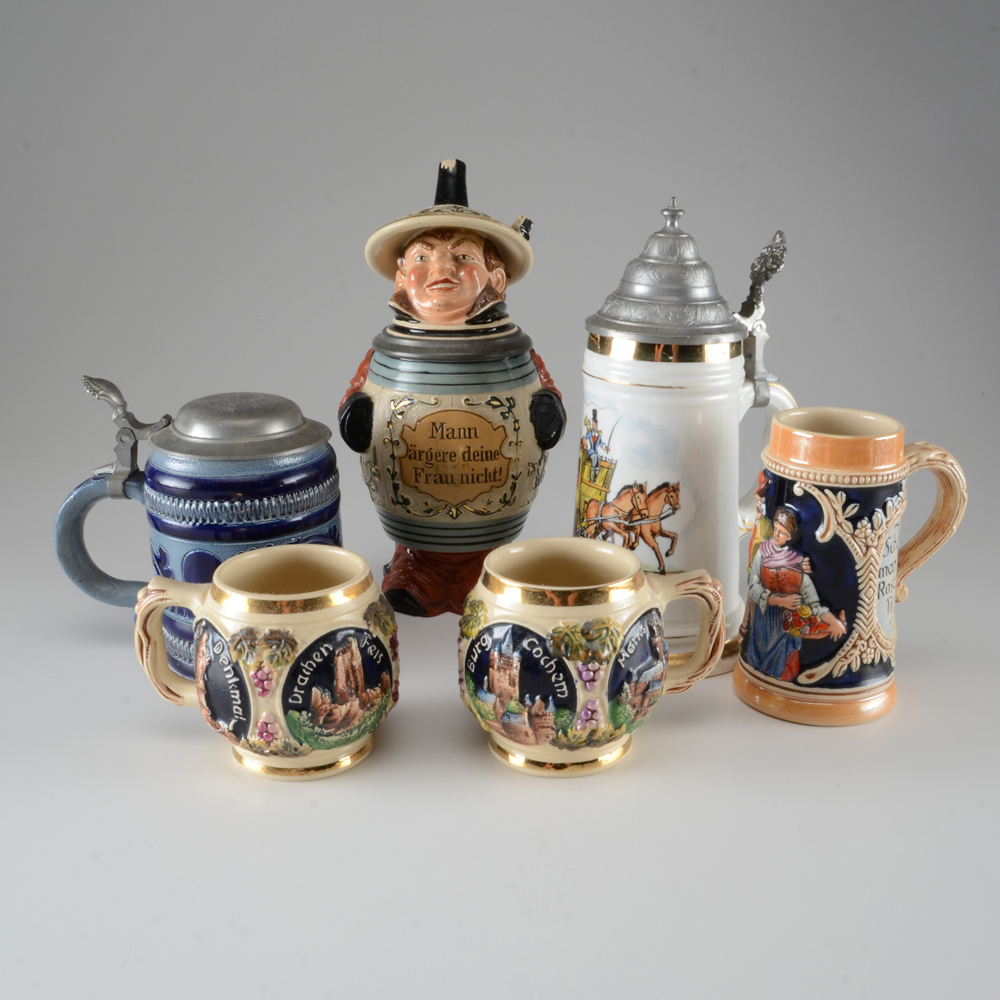 Collection of Vintage Beer Steins and Mugs