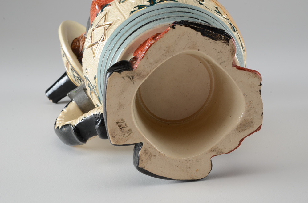 Collection of Vintage Beer Steins and Mugs