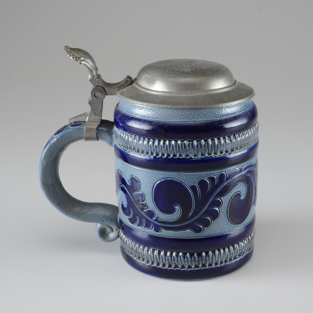 Collection of Vintage Beer Steins and Mugs