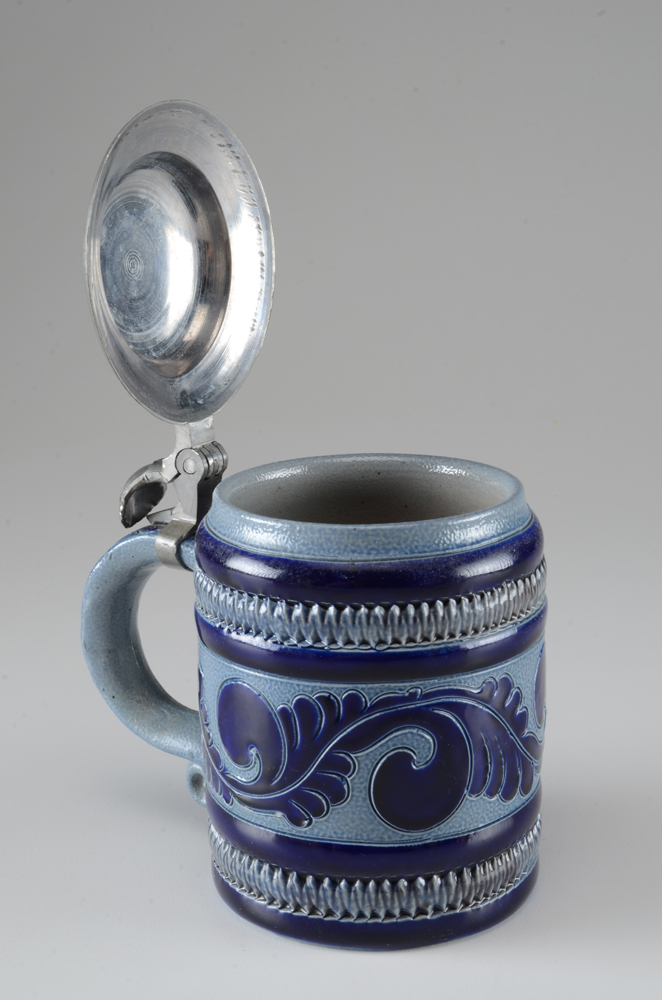 Collection of Vintage Beer Steins and Mugs