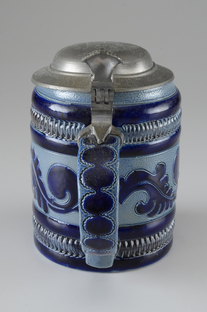 Collection of Vintage Beer Steins and Mugs