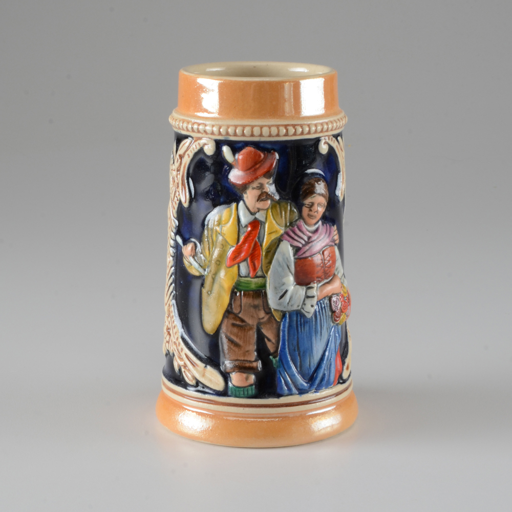 Collection of Vintage Beer Steins and Mugs