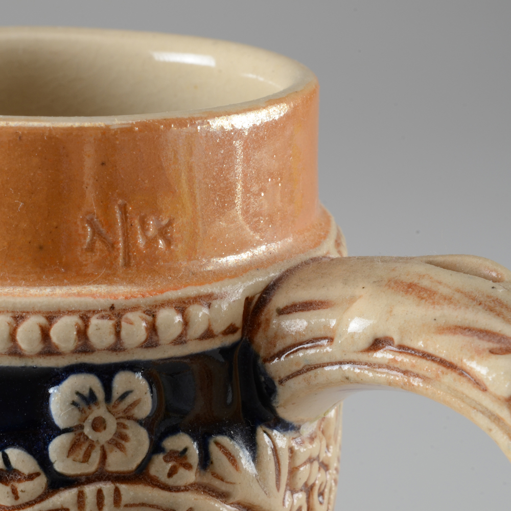 Collection of Vintage Beer Steins and Mugs