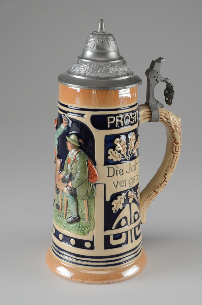 Collection of Vintage Beer Steins and Mugs