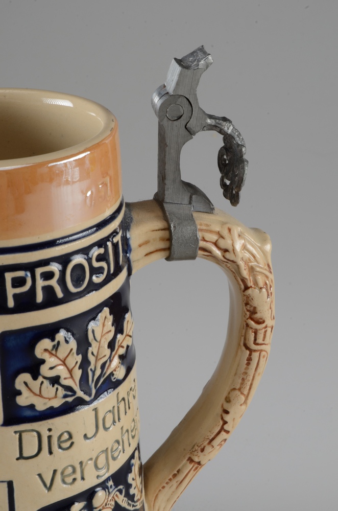 Collection of Vintage Beer Steins and Mugs