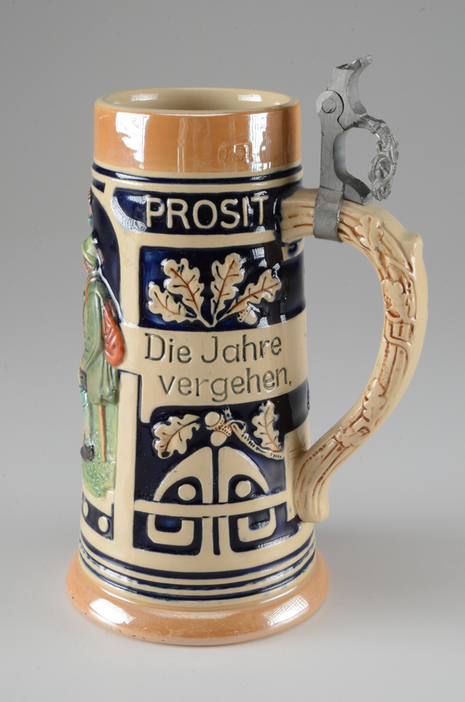 Collection of Vintage Beer Steins and Mugs