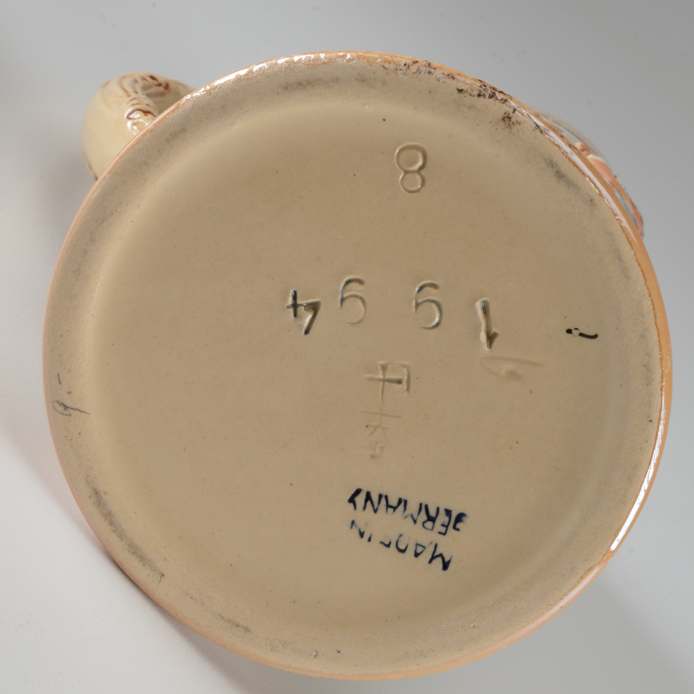 Collection of Vintage Beer Steins and Mugs