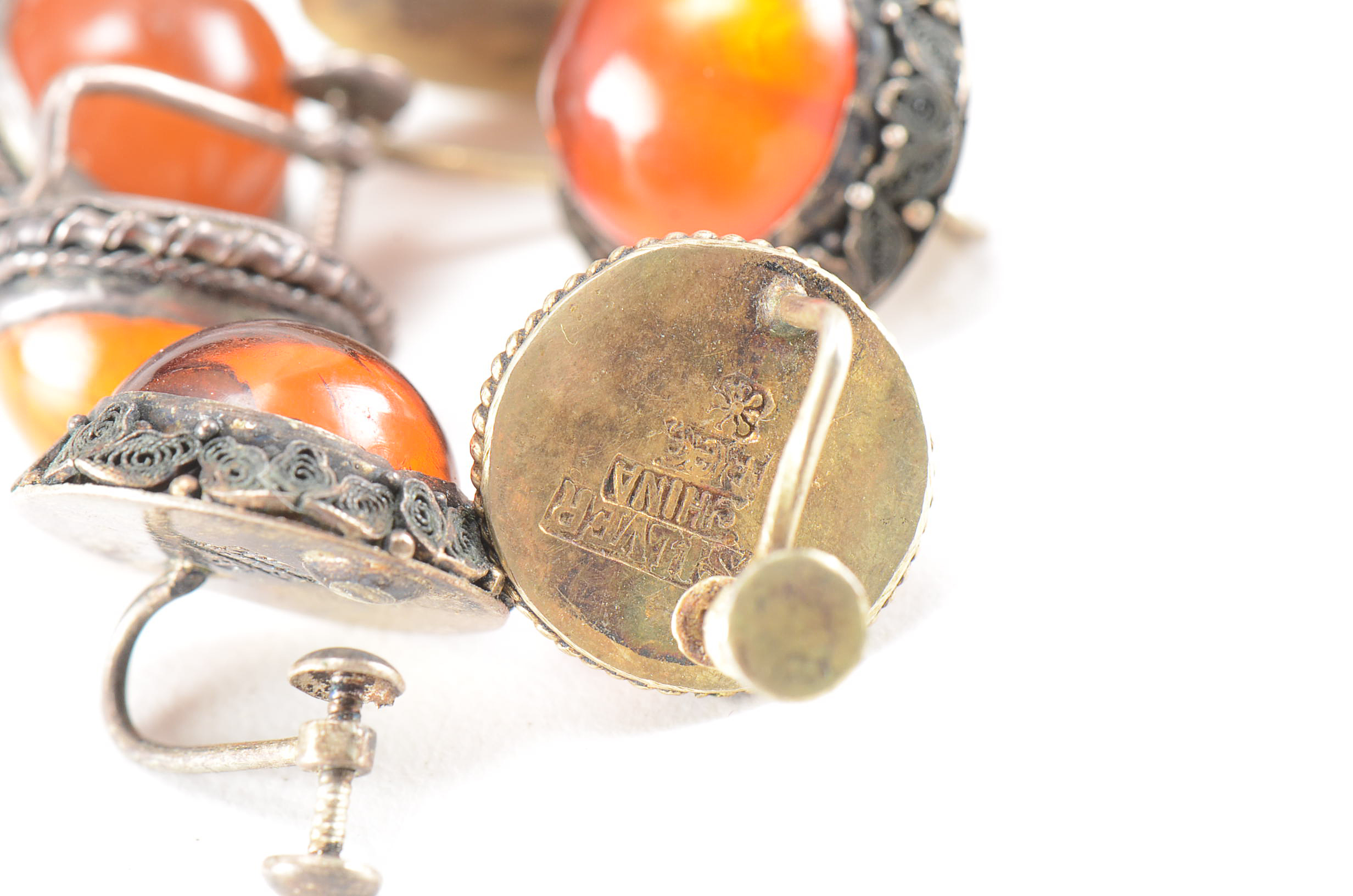 Group of Early 20th Century Chinese Export Amber and Silver Screw Back Earrings