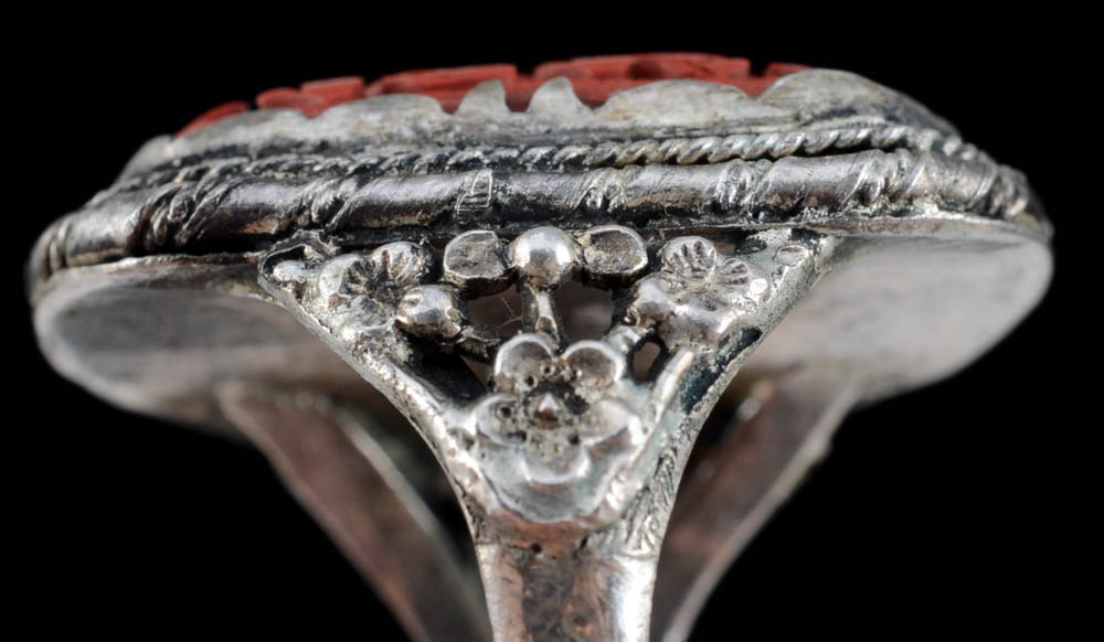 Early 20th Century Chinese Carved Cinnabar and 900 Silver Openwork Ring