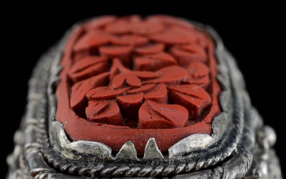 Early 20th Century Chinese Carved Cinnabar and 900 Silver Openwork Ring