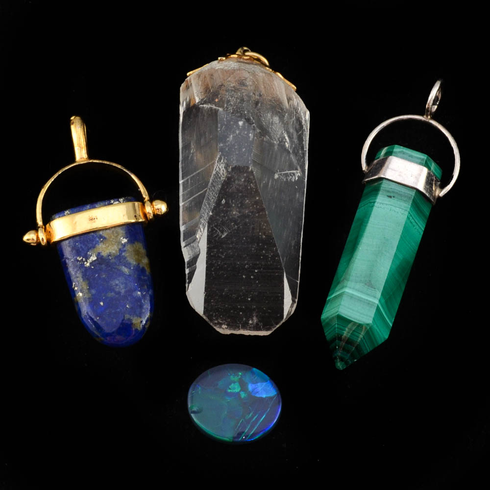 Loose 2.64 Carat Natural Black Boulder Opal Cabochon and Three Polished Stone Pendants